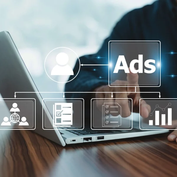 “Paid advertising strategy showing ads performance and analytics on laptop”